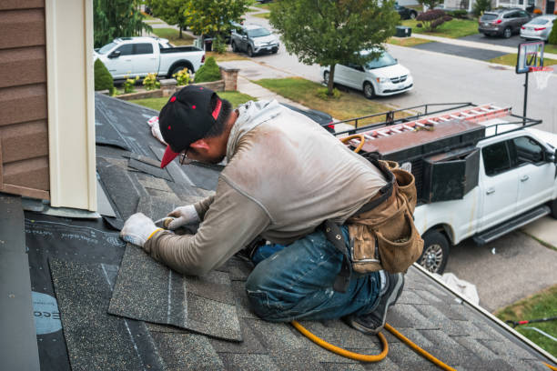 Professional Flat Roof Repair technician working in Tioga, ND